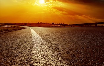 Asphalt Road at Sunset